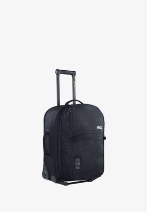 Bolsa de viaje negra con ruedas, exterior texturizado, doble cremallera, bolsillo frontal, asa telescópica resistente y ruedas reforzadas para mayor durabilidad.