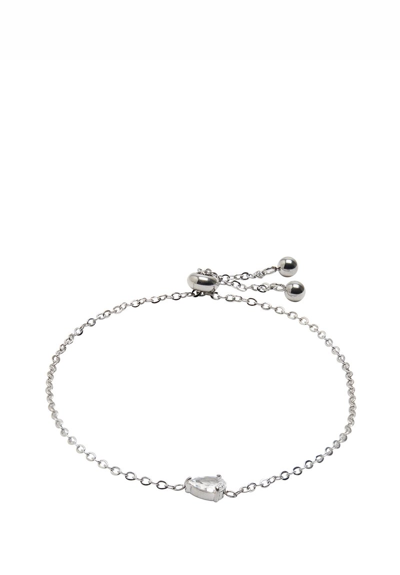 Srebrna bransoletka łańcuszkowa z centralnym kamieniem w kształcie gruszki, który jest przezroczysty. Posiada regulowany zapięcie z dwoma okrągłymi koralikami. Prosty i delikatny design.