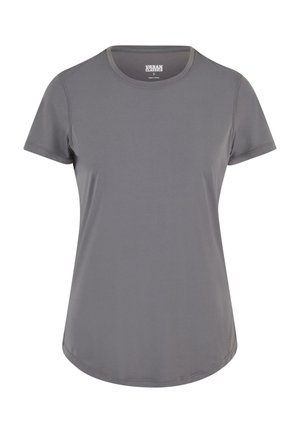 Camiseta gris de manga corta, hecha de tela suave, con cuello redondo y dobladillo curvado. Diseño simple sin patrones ni acentos.