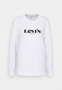 Langärmliges, weißes T-Shirt aus Baumwolle, mit einem großen schwarzen "Levi's"-Logo und dem darunter gedruckten Text "Seit 1873".