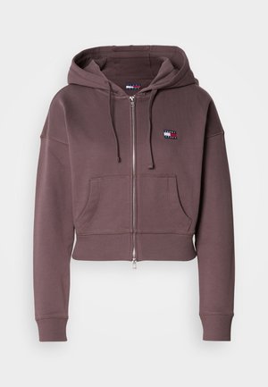 Beskarret zip-hoodie i støvet mauve. Fremstillet af blød bomuldsblanding, har for- lomme, justerbar snor i huen og logo-patch.