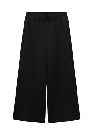 Pantalons larges noirs en tissu texturé, munis de poches latérales et d'une taille lisse, conçus pour un ajustement ample.