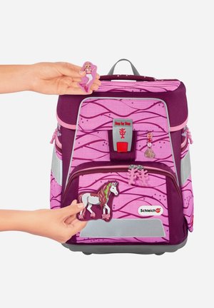 Lila und rosa Kinder-Rucksack mit Wellenmustern, grauen Akzenten und zwei abnehmbaren Charakter-Patches: einem Einhorn und einer Meerjungfrau.