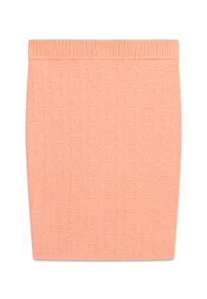 Jupe crayon en tricot couleur pêche avec taille côtelée et motif subtil de nœud texturé sur tout le tissu.