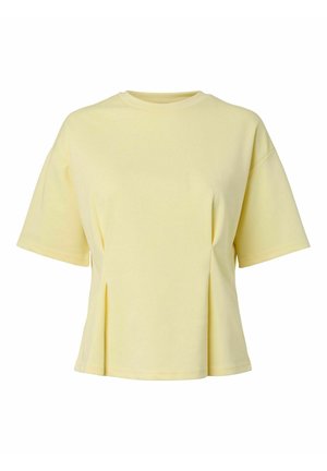 T-shirt à manches courtes de couleur jaune clair en coton doux, avec une coupe décontractée et des côtés plissés pour un détail de design supplémentaire.
