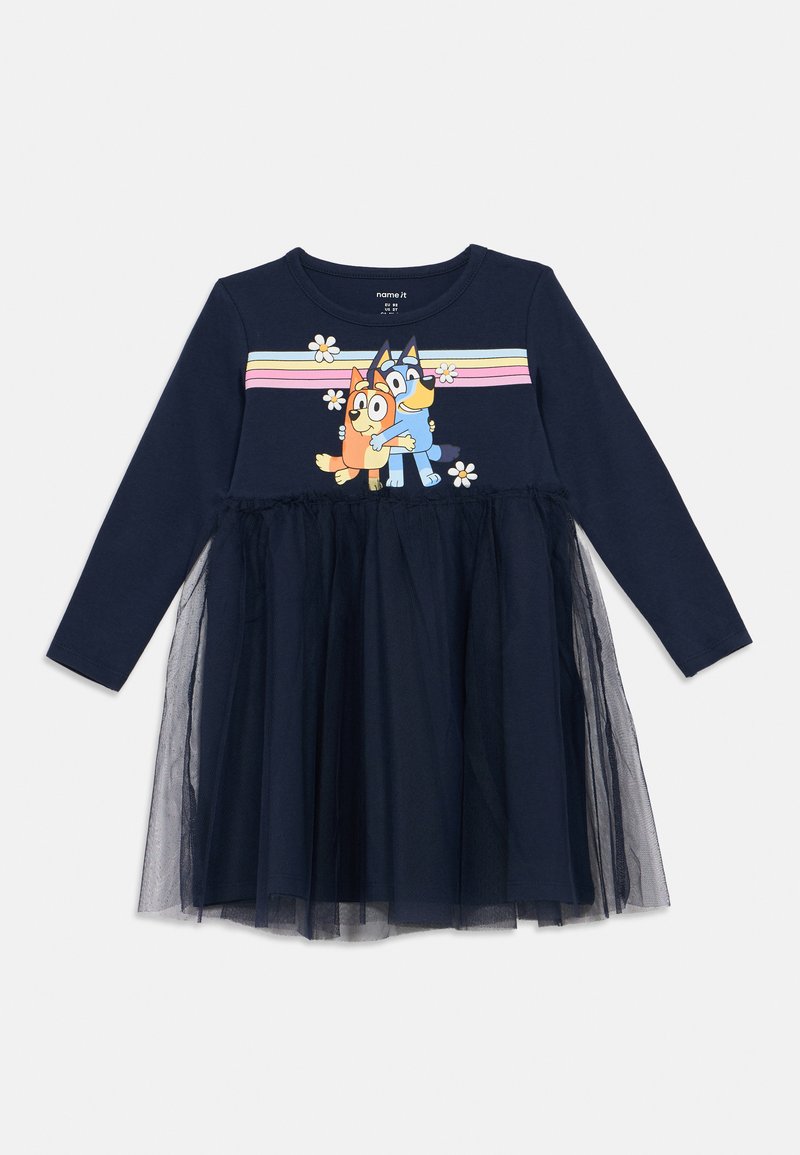 Marineblaue Langarmkleid mit einem Oberteil aus Baumwolle und einem Tüllrock. Verfügt über ein farbenfrohes Gummidruckdesign von zwei Cartoon-Hunden und floralen Akzenten.