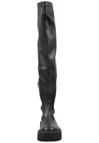 Bottes noires en cuir, montantes jusqu'à la cuisse, avec une texture lisse, dotées d'une fermeture éclair sur le côté et d'une semelle épaisse.