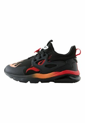 Black athletic shoe with flame design in red and orange. Features a textured upper, smooth sole, and a secure lace-up closure.