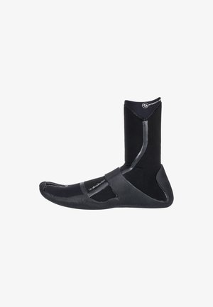 Black neoprene boot with a high ankle, textured bottom, and adjustable strap over the foot, designed for water activities.