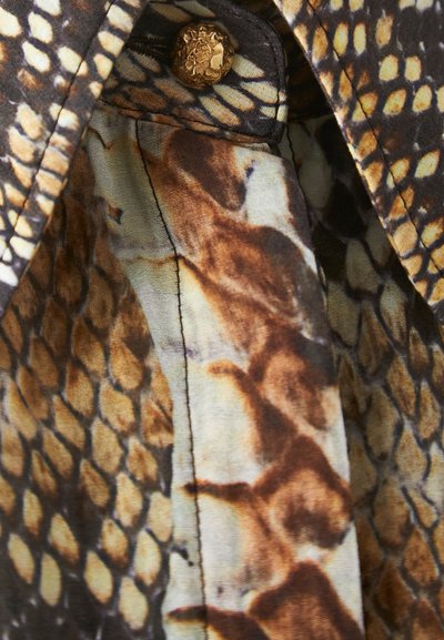 Collared shirt featuring a snake print pattern in brown and beige tones, with a gold button and a smooth, lightweight fabric texture.