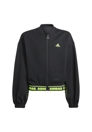 Veste zippée noire Adidas avec logo jaune néon sur la poitrine et texte Adidas assorti sur la ceinture élastique et les éléments des manches.
