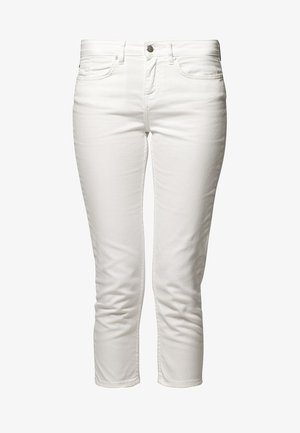 Jean blanc slim à coupe ajustée avec bouton et fermeture éclair à l'avant, design à cinq poches et longueur aux chevilles raccourcie.