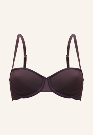 Bøjle-bh i dyb lilla med glat, tekstureret stof. Har justerbare stropper og guldfarvede metaldetaljer.