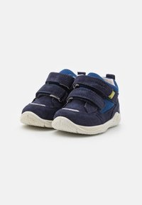 Navy blue children's shoes with suede material, mesh accents, and two Velcro straps. Light rubber outsole with textured grip.