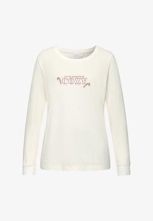 Bela dolgimi rokavi srajca iz mehkega blaga, ki vsebuje besedilo "SEZONA, DA BI BILI UDOBNI" v rdeči barvi z akcenti sladkih palic.