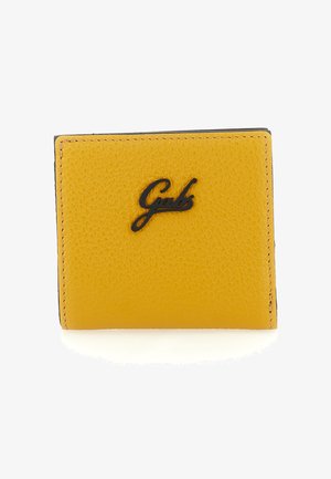 Portafoglio in pelle giallo brillante con il logo nero "Gabs" centrato sulla parte anteriore, cuciture visibili lungo i bordi.