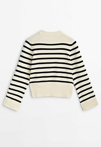 Pull court à rayures crème avec des rayures horizontales noires, poignets et col côtelés. Texture douce avec un design épuré et simple.