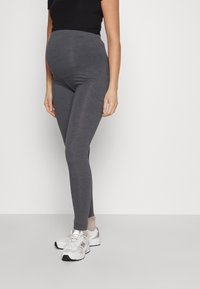 Gray maternity leggings made from soft, stretchy material, featuring a high waistband designed for comfort and support during pregnancy.