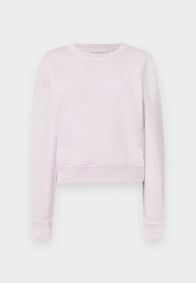 Heledalt roosa lühike sviiter, mis on valmistatud pehmest kangast. Omab pikka varrukat ja esiküljel on sama värvi tikand "CLOSED" logo.