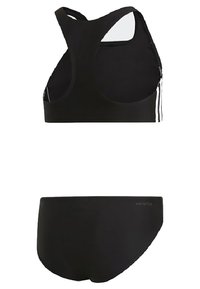 Set da nuoto nero con top a schiena scoperta e inserti in mesh, e due strisce bianche; parte inferiore coordinata in nero solido con dettaglio del logo "INFINITEX".
