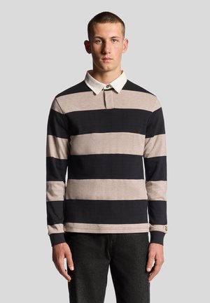Langærmet polo-shirt med sorte og lyse beige vandrette striber, en hvid krave og diskret logo-detalje på ærmet.