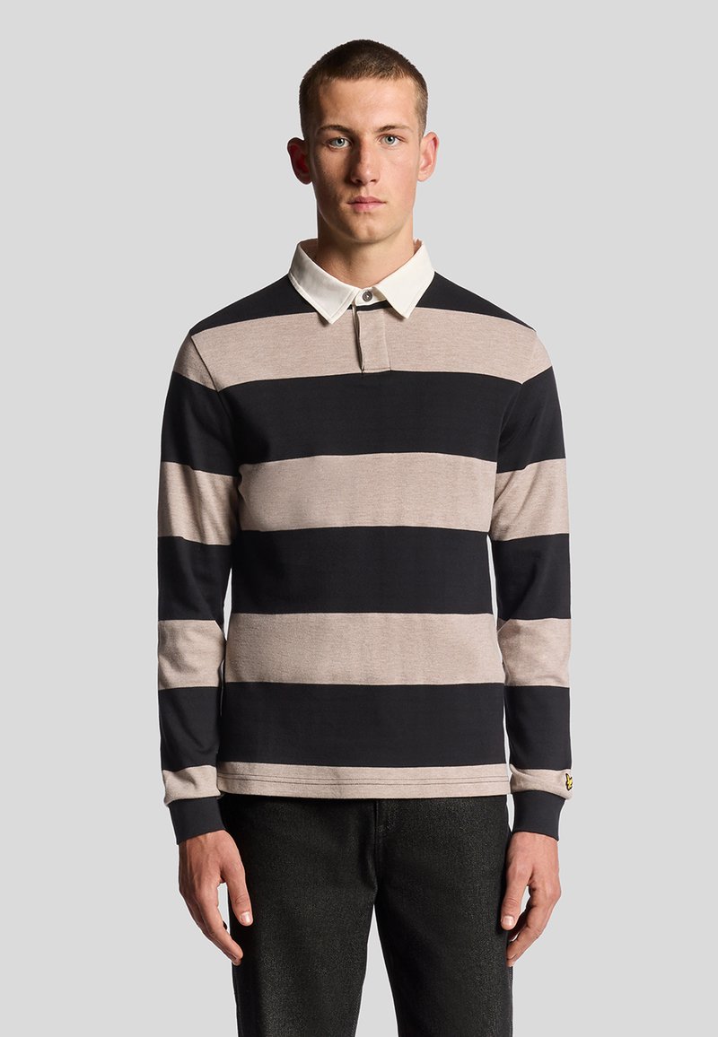 Langärmliges Poloshirt mit schwarzen und hellbeige horizontalen Streifen, einem weißen Kragen und dezentem Logo-Detail am Ärmeln.