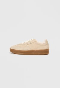 Sélectionné, beige