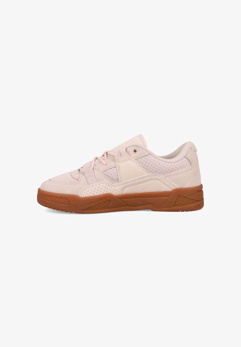 Light pink low-top sneaker with perforated details, laces, and thick gum brown sole, shown in side profile on a white background.