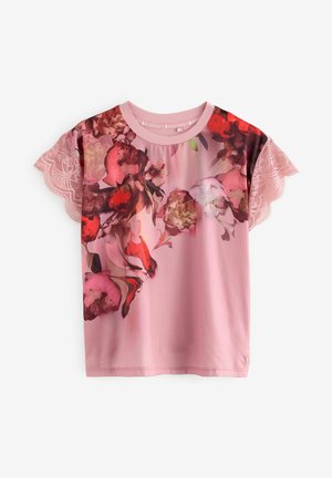 Rosa kurzärmeliges T-Shirt mit rotem und weißem Blumenmuster. Mit Spitzenakzenten an den Ärmeln und einem runden Ausschnitt. Weicher, leichter Stoff.