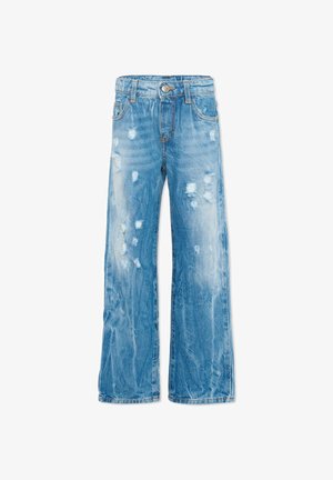 Jean en denim bleu clair avec une coupe décontractée, présentant des zones usées et un effet délavé sur les cuisses et les genoux à l'avant.