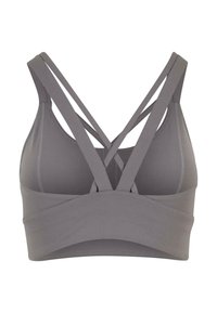 Gray sports bra with a layered crisscross strap design. Smooth fabric with opaque texture and elastic band at the bottom for comfort.