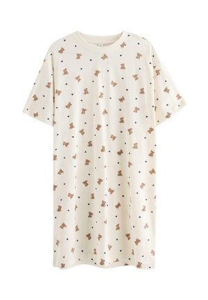 Kortærmet cremefarvet kjole med et mønster af små brune tøjdyr og marineblå hjerter over hele.