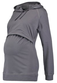 Felpa per maternità grigia realizzata in un tessuto morbido. Presenta un design con incrocio nella parte anteriore, maniche lunghe e cappuccio con cordino. Texture liscia in tutto il capo.