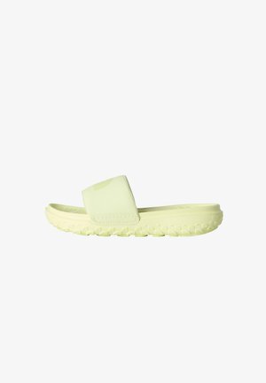 Sandalo slide di colore giallo chiaro con ampia fascia e suola texturizzata, progettato per un uso casual e comfort.