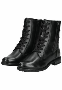 Stivali ankle in pelle nera con lacci frontali e zip laterali. Caratterizzati da una superficie liscia e un design con tacco basso e piatto.