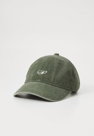 Green baseball cap with curved brim and small white abstract logo embroidered on front center, displayed on plain white background.