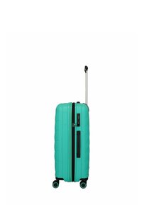 Valigia rigida color teal con superficie texturizzata, cerniera nera e manico retrattile. Presenta quattro ruote per la mobilità.