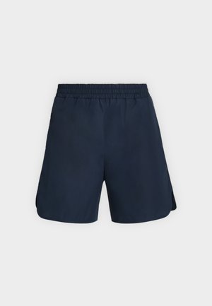 Pantaloncini sportivi blu navy con elastico in vita e spacchi laterali, mostrati distesi su uno sfondo chiaro e uniforme.