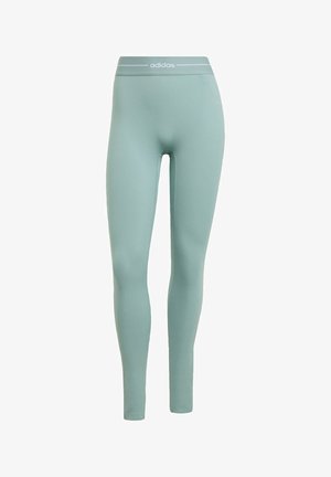 Zielone legginsy z wysokim stanem wykonane z gładkiej, elastycznej tkaniny; posiadają biały logo na pasku oraz dopasowany krój.