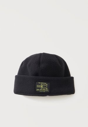 Черна поларена шапка с удебелен кант с кръпка с надпис "The North Face Snow and Sports Rec" и жълта ски графика.
