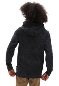Felpa con cappuccio nera dal finish testurizzato, dotata di tasca a marsupio e polsini a costine. Il design ha una vestibilità rilassata e un orlo dritto.