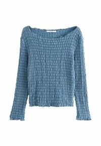 Texturerad blå stickad tröja med vid halsringning och långa ärmar, med ett ribbat mönster och något fransad nederkant.