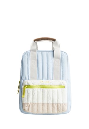 Light blue quilted backpack with beige front pocket, yellow zipper, and white handles with brown leather grip on a white background.