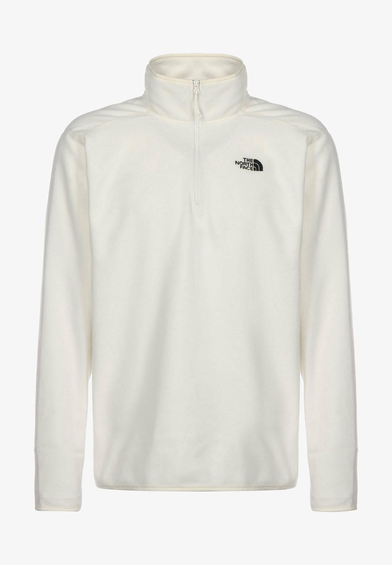 Pull polaire blanc à manches longues avec fermeture éclair au quart et col montant, avec logo noir "The North Face" sur la poitrine gauche.