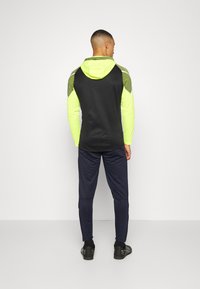 JAKO ALLROUND - Jogginghose - marine/neongelb