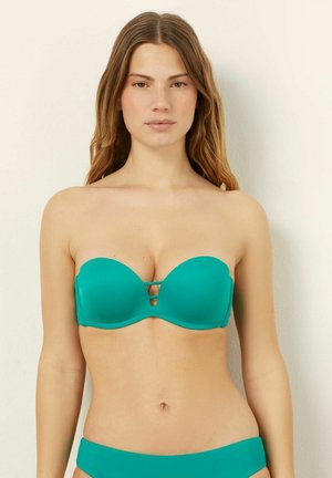 Turquoise strapless bikini top met een gladde textuur, met een subtiele uitsnede tussen de cups en met gevoerde inzetstukken voor ondersteuning.
