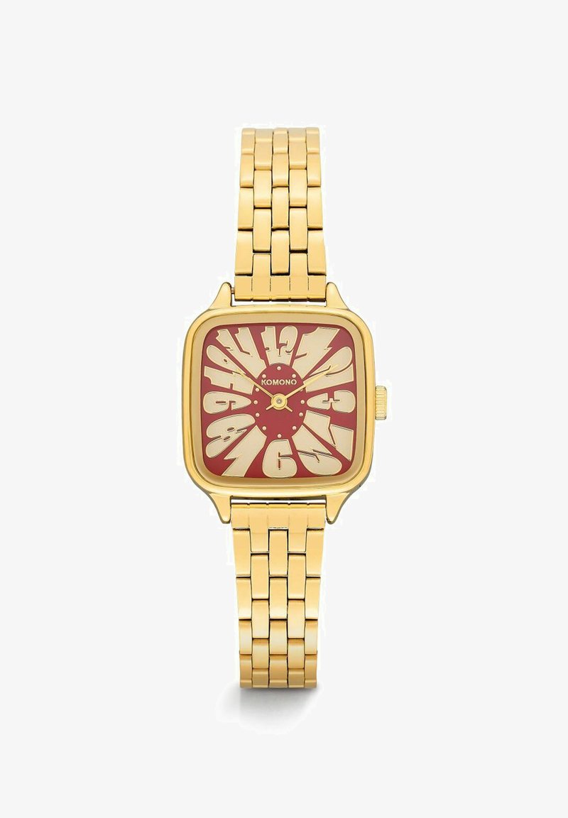 Montre en or avec un cadran rouge carré, de grands chiffres stylisés en or, un bracelet en maillons d'or et trois aiguilles dorées affichant 10:10:09.