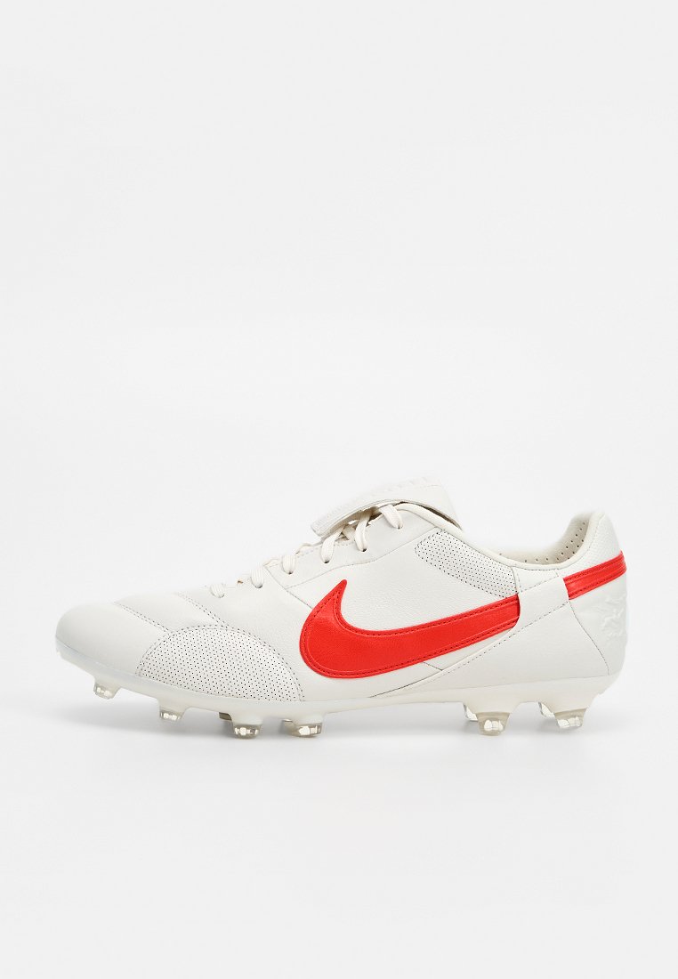 Botines de fútbol para terreno firme