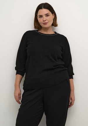 Black, knit sweater with a rounded neckline and three-quarter sleeves. Notable silver detailing along the neckline, relaxed fit.