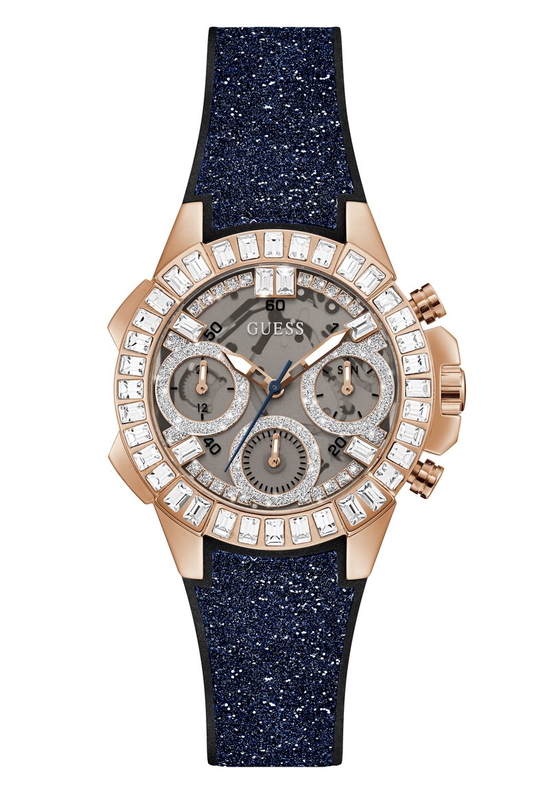 Montre chronographe en or rose avec un cadran gris, des accents en cristal et un bracelet en paillettes bleu marine. Comprend trois sous-cadrans et une lunette polie.